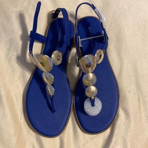 Bandolino sandals, royal blue, size 7.5 women’s.  Never worn still in box.